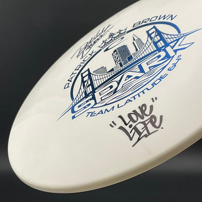 Gold Spark *Signed* - Patrick Brown Team Latitude 64 LE